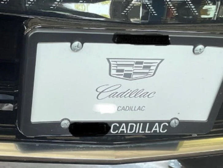 The front license plate frame may cause intermittent park assist warnings.