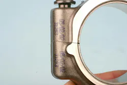 The cap on this powder metal rod has begun to separate and is ready to be removed. Each cap must remain with its original rod, since the “fracturing” process results in a unique mating surface much like a fingerprint. The cap on this powder metal rod has begun to separate and is ready to be removed. Each cap must remain with its original rod, since the “fracturing” process results in a unique mating surface much like a fingerprint.