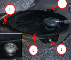 1) Fuel pump access cover screws; 2) Access cover. 1) Fuel pump access cover screws; 2) Access cover.