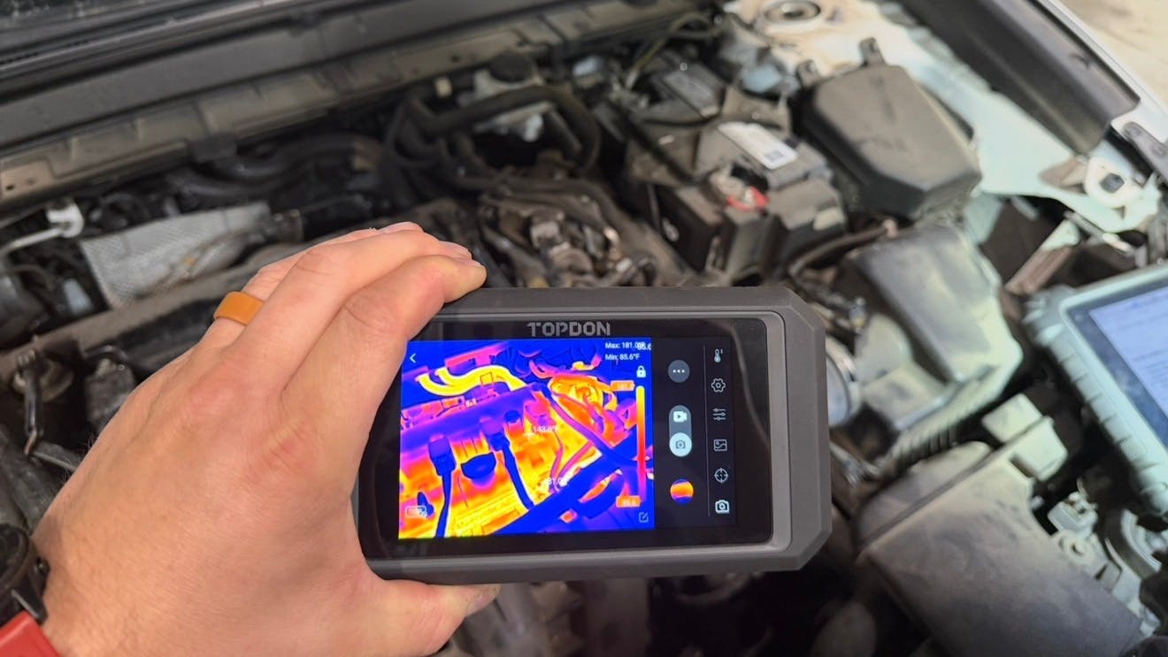 In a shop environment, having a dedicated, standalone thermal imaging unit simplifies workflow. Product pictured: TOPDON TC003