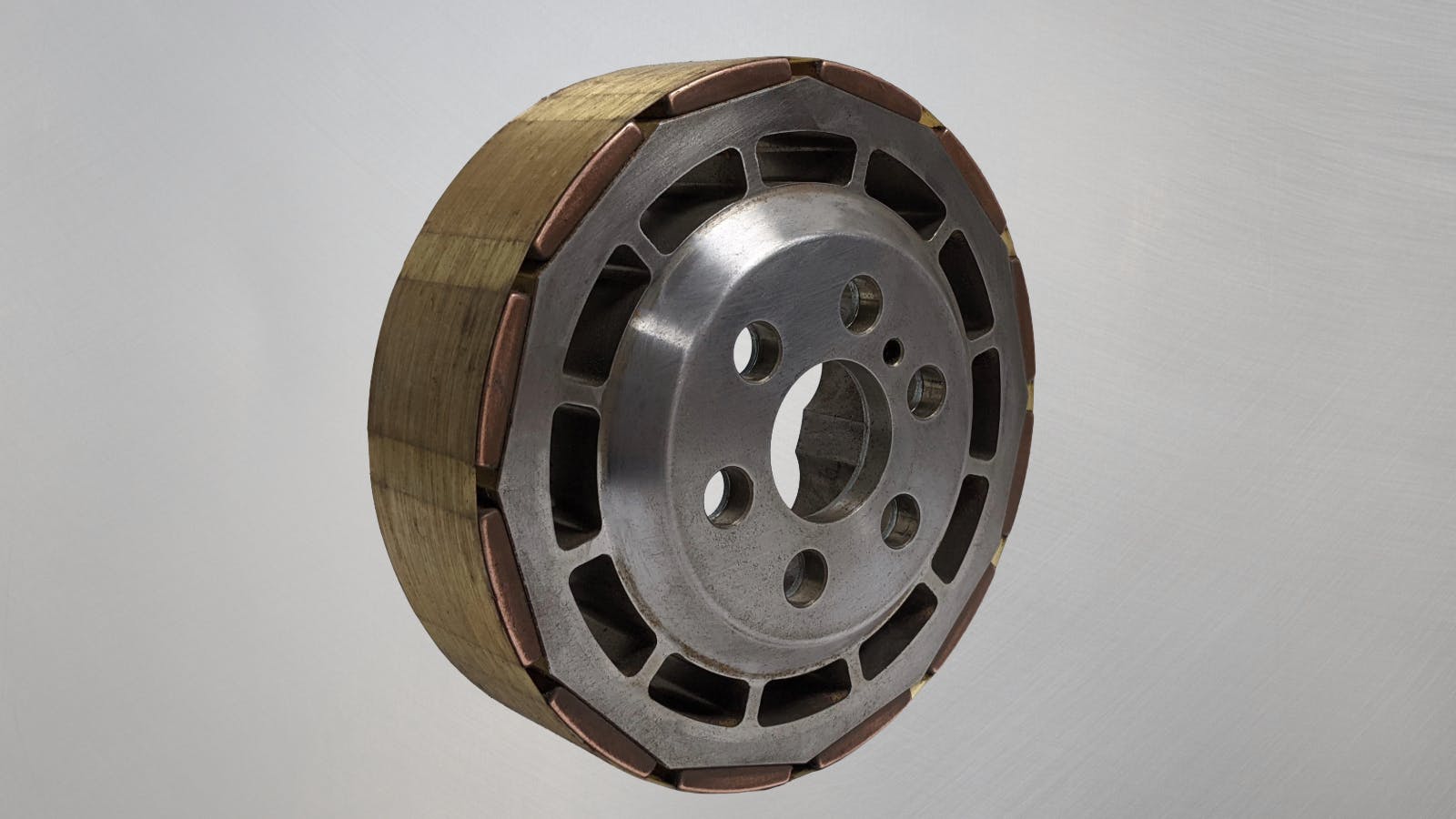 An old school Honda rotor with magnets bonded to the outer surface.