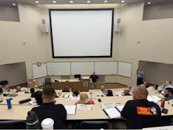The class worked through financial leadership concepts and risk-factor analysis during the morning session.
