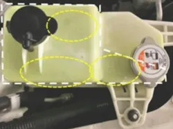 Example of coolant reserve tank leak areas (see circled in yellow).
